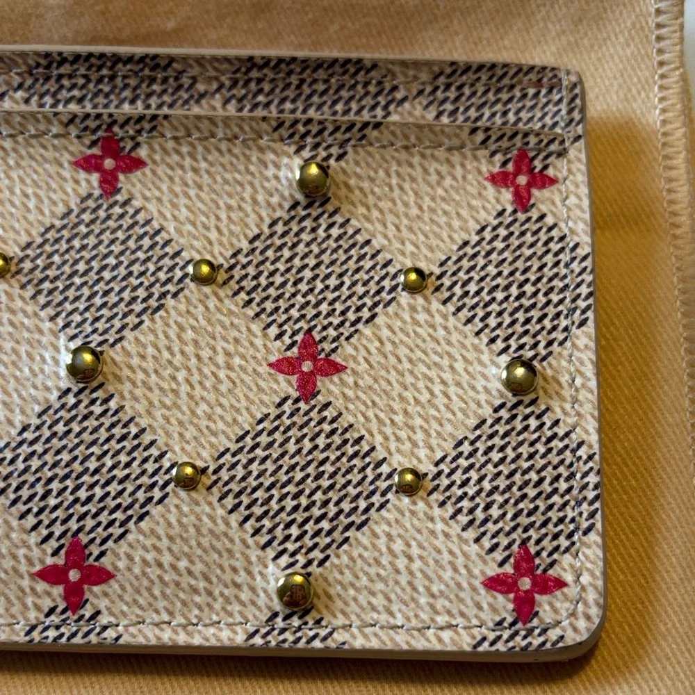 Louis Vuitton Damier Azur Studded Card Holder in the white and pink color